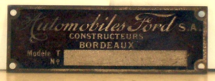 dealer plaque french.jpg