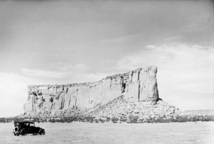 Auto_in_front_of_large_rock_formation__Utah.jpg
